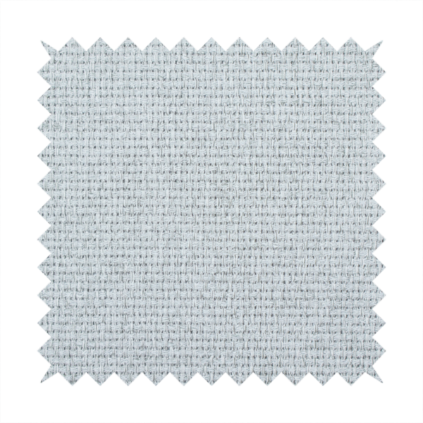 A very light ice-grey or tinted white fabric featuring a distinct, tightly woven grid texture. The material showcases a multi-tonal, basket-weave style pattern with blended pale silver and crisp off-white threads, creating a bright, minimalist, and matte finish across the entire surface.