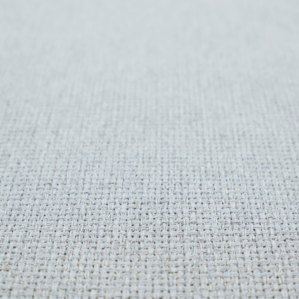 A very light ice-grey or tinted white fabric featuring a distinct, tightly woven grid texture. The material showcases a multi-tonal, basket-weave style pattern with blended pale silver and crisp off-white threads, creating a bright, minimalist, and matte finish across the entire surface.