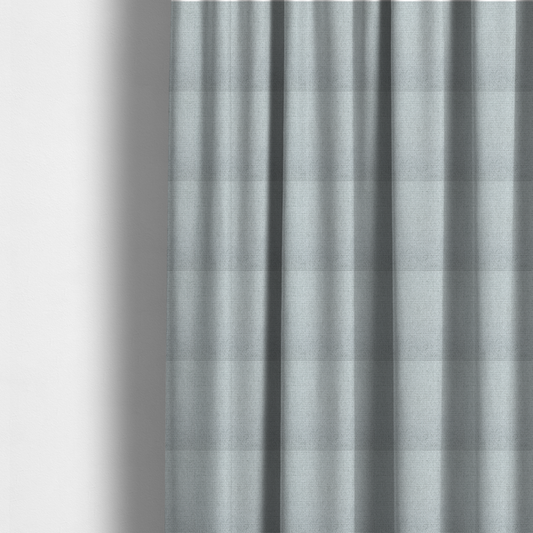 the fabric used to create these made-to-measure curtains is a very light ice-grey or tinted white fabric featuring a distinct, tightly woven grid texture. The material showcases a multi-tonal, basket-weave style pattern with blended pale silver and crisp off-white threads, creating a bright, minimalist, and matte finish across the entire surface.