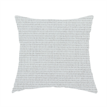 The fabric used to create this handmade cushion is a light grey or soft ash fabric featuring a distinct, tightly woven grid texture. The material showcases a multi-tonal, basket-weave style pattern with blended pale grey and subtle white threads, creating a clean, neutral, and matte finish across the entire surface.