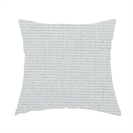The fabric used to create this handmade cushion is a light grey or soft ash fabric featuring a distinct, tightly woven grid texture. The material showcases a multi-tonal, basket-weave style pattern with blended pale grey and subtle white threads, creating a clean, neutral, and matte finish across the entire surface.