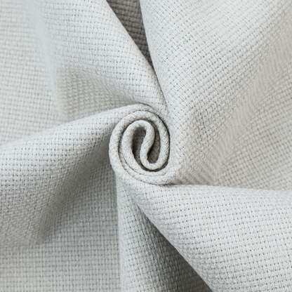 A light grey or soft ash fabric featuring a distinct, tightly woven grid texture. The material showcases a multi-tonal, basket-weave style pattern with blended pale grey and subtle white threads, creating a clean, neutral, and matte finish across the entire surface.