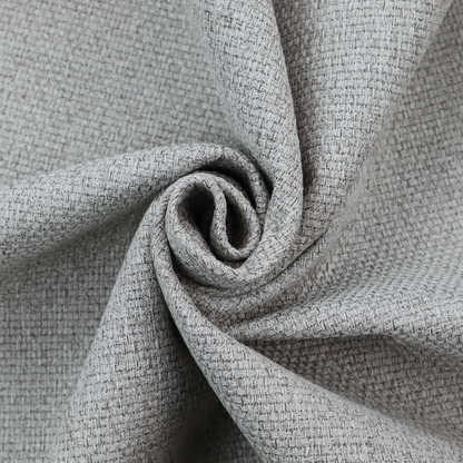 A mid-grey or stone-grey fabric featuring a distinct, tightly woven grid texture. The material showcases a multi-tonal, basket-weave style pattern with blended cool grey, taupe, and subtle white threads, creating a grounded, textured neutral, and matte finish across the entire surface.