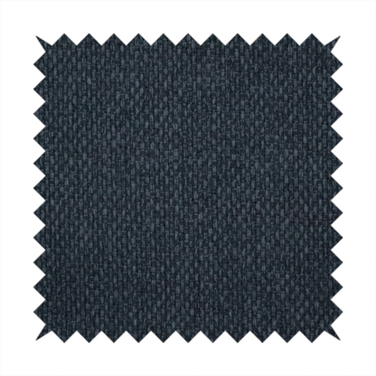 A dark charcoal-grey or slate fabric featuring a distinct, tightly woven grid texture. The material showcases a rich, multi-tonal, basket-weave style pattern with blended deep grey, subtle navy, and black threads, creating a moody, sophisticated, and matte finish across the entire surface.