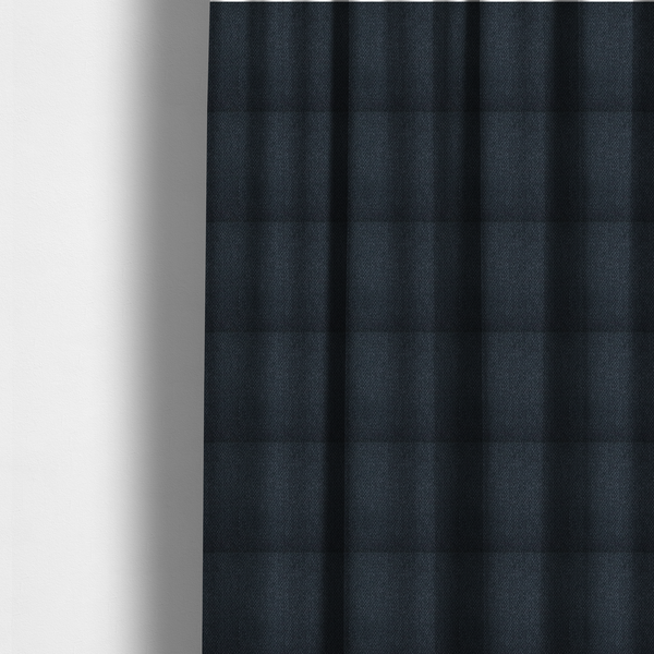 The fabric used to create these made-to-measure curtains is a dark charcoal-grey or slate fabric featuring a distinct, tightly woven grid texture. The material showcases a rich, multi-tonal, basket-weave style pattern with blended deep grey, subtle navy, and black threads, creating a moody, sophisticated, and matte finish across the entire surface.