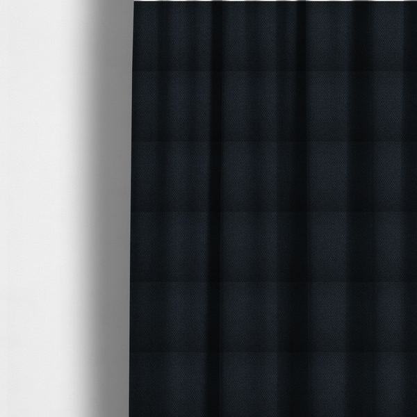 The fabric used to create these made-to-measure curtains is a deep midnight-black or ink-black fabric featuring a distinct, tightly woven grid texture. The material showcases a rich, multi-tonal, basket-weave style pattern with interlaced charcoal and solid black threads, creating a dramatic, subtle, and matte finish across the entire surface.