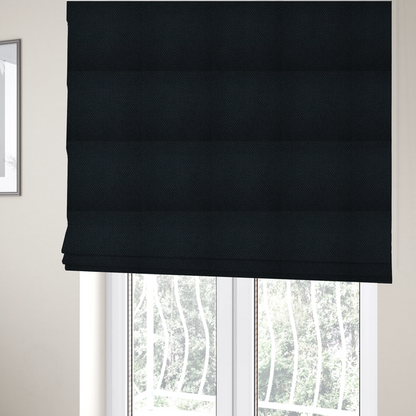 The fabric used to create these Roman blinds is a deep midnight-black or ink-black fabric featuring a distinct, tightly woven grid texture. The material showcases a rich, multi-tonal, basket-weave style pattern with interlaced charcoal and solid black threads, creating a dramatic, subtle, and matte finish across the entire surface.