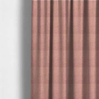 The fabric used to create these made-to-measure curtains is a textured upholstery fabric in a soft, light blush pink shade. The material features a distinctive cross-hatched slub texture with fine vertical and horizontal ridges, creating a plush, tactile chenille finish.