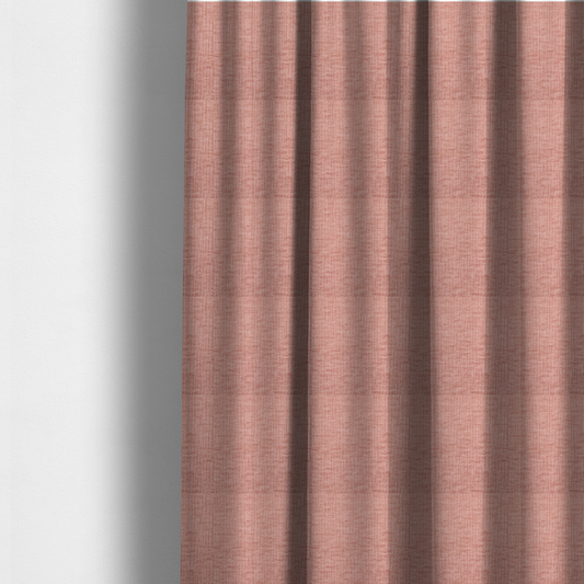 The fabric used to create these made-to-measure curtains is a textured upholstery fabric in a soft, light blush pink shade. The material features a distinctive cross-hatched slub texture with fine vertical and horizontal ridges, creating a plush, tactile chenille finish.