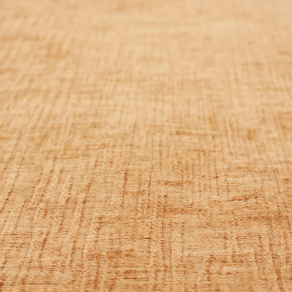 A textured upholstery fabric in a warm, honey-gold or mustard yellow colour. The material features a distinct cross-hatched slub texture with subtle vertical and horizontal ridges, creating a soft, dimensional chenille finish.