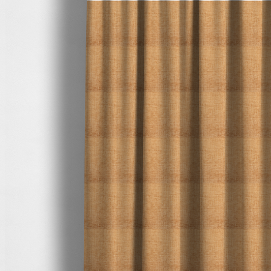 The fabric used to create these made-to-measure curtains is a textured upholstery fabric in a warm, honey-gold or mustard yellow colour. The material features a distinct cross-hatched slub texture with subtle vertical and horizontal ridges, creating a soft, dimensional chenille finish.