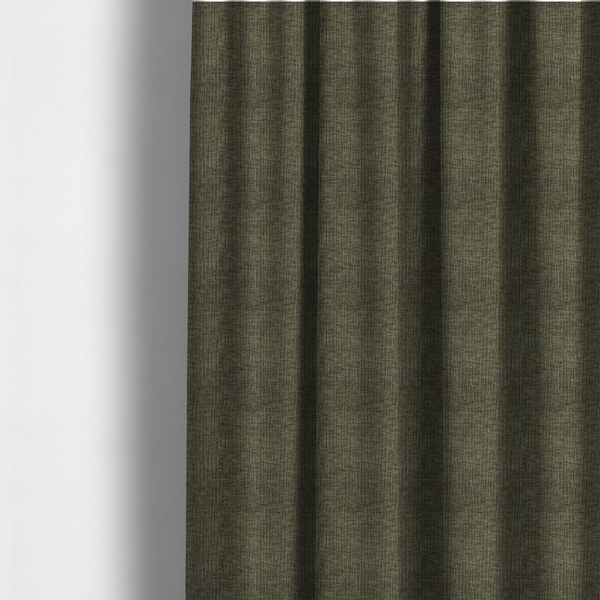 The fabric used to create these made-to-measure curtains is a textured upholstery fabric in an earthy olive or sage green colour. The material features a prominent cross-hatched slub texture with subtle horizontal and vertical ridges, giving it a cosy, multi-dimensional chenille appearance.