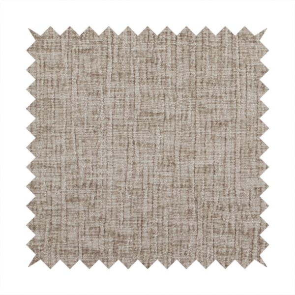 A textured upholstery fabric in a neutral taupe or greige colour. The material features a distinctive cross-hatched slub texture with subtle vertical and horizontal ridges, creating a soft, dimensional chenille finish.