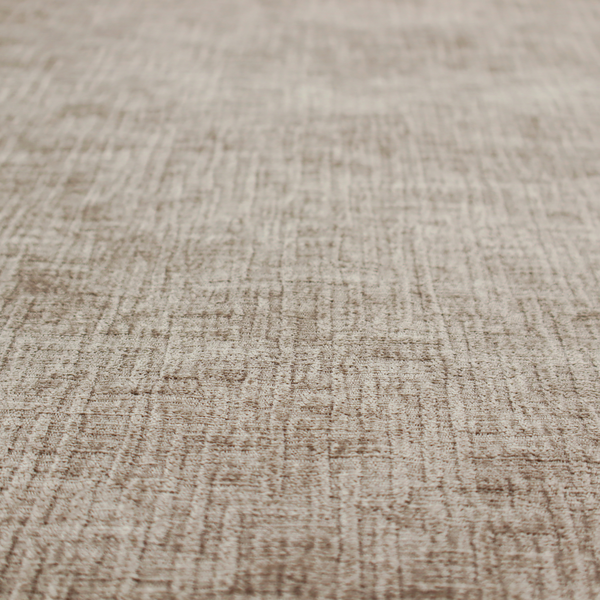 A textured upholstery fabric in a neutral taupe or greige colour. The material features a distinctive cross-hatched slub texture with subtle vertical and horizontal ridges, creating a soft, dimensional chenille finish.