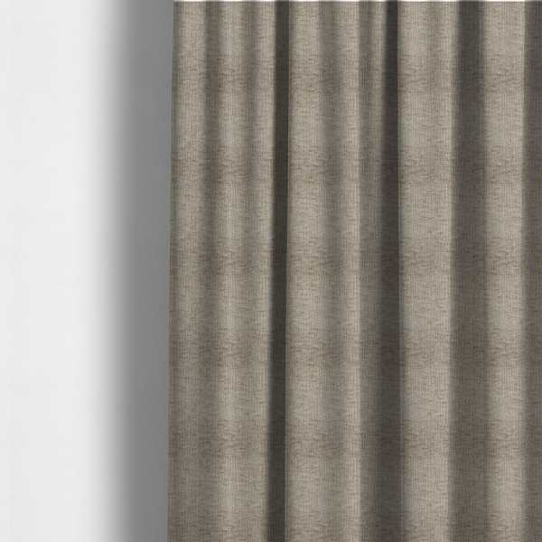 The fabric used to create these made-to-measure curtains is a textured upholstery fabric in a neutral taupe or greige colour. The material features a distinctive cross-hatched slub texture with subtle vertical and horizontal ridges, creating a soft, dimensional chenille finish.