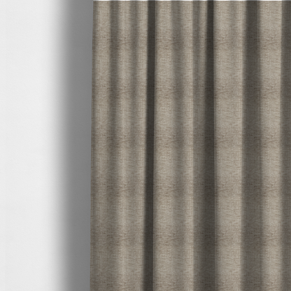 The fabric used to create these made-to-measure curtains is a textured upholstery fabric in a neutral taupe or greige colour. The material features a distinctive cross-hatched slub texture with subtle vertical and horizontal ridges, creating a soft, dimensional chenille finish.