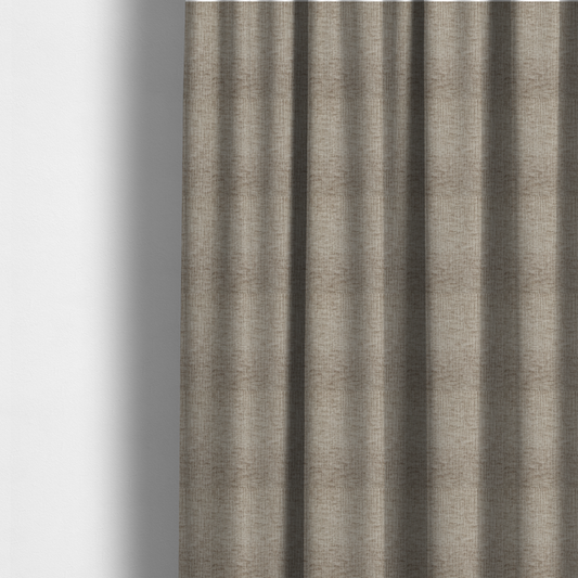 The fabric used to create these made-to-measure curtains is a textured upholstery fabric in a neutral taupe or greige colour. The material features a distinctive cross-hatched slub texture with subtle vertical and horizontal ridges, creating a soft, dimensional chenille finish.