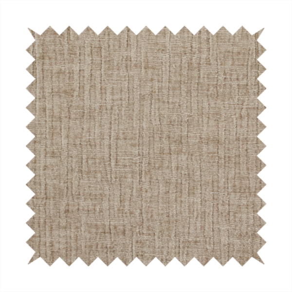 A textured upholstery fabric in a warm, neutral beige or oatmeal colour. The material features a distinct cross-hatched slub texture with fine vertical and horizontal ridges, creating a soft, dimensional chenille finish.