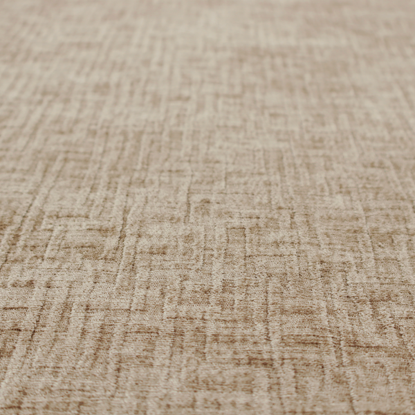 A textured upholstery fabric in a warm, neutral beige or oatmeal colour. The material features a distinct cross-hatched slub texture with fine vertical and horizontal ridges, creating a soft, dimensional chenille finish.