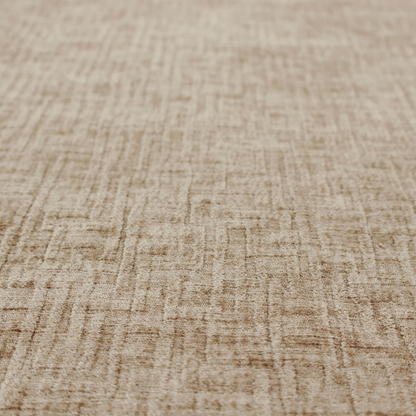A textured upholstery fabric in a warm, neutral beige or oatmeal colour. The material features a distinct cross-hatched slub texture with fine vertical and horizontal ridges, creating a soft, dimensional chenille finish.
