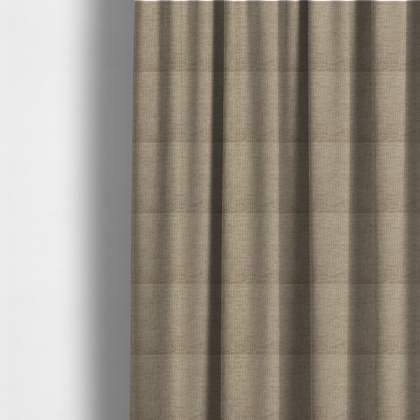 The fabric used to create these made-to-measure curtains is a textured upholstery fabric in a warm, neutral beige or oatmeal colour. The material features a distinct cross-hatched slub texture with fine vertical and horizontal ridges, creating a soft, dimensional chenille finish.