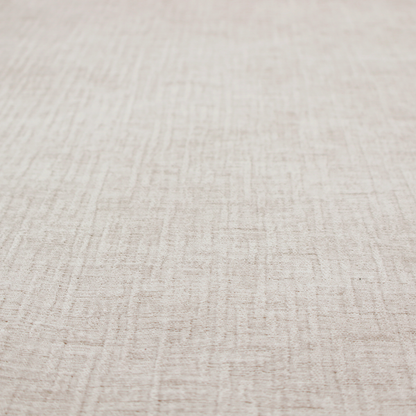 A textured upholstery fabric in a light cream or ivory colour. The material features a subtle cross-hatched slub texture with fine vertical and horizontal ridges, creating a soft, dimensional chenille finish.