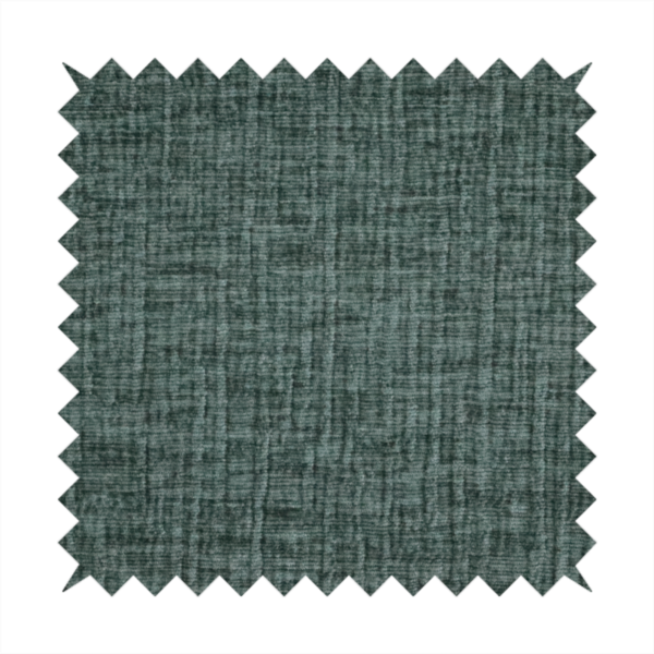 A textured upholstery fabric in a deep teal or eucalyptus green colour. The material features a distinct cross-hatched slub texture with subtle vertical and horizontal ridges, creating a soft, dimensional chenille finish.
