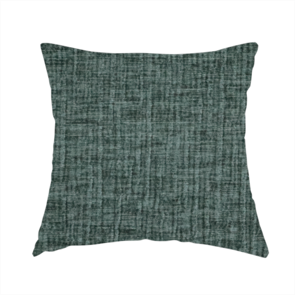 The fabric used to create this handmade cushion is a textured upholstery fabric in a deep teal or eucalyptus green colour. The material features a distinct cross-hatched slub texture with subtle vertical and horizontal ridges, creating a soft, dimensional chenille finish.