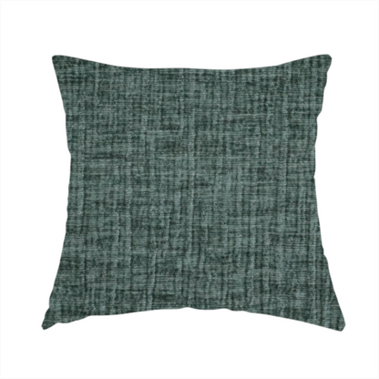 The fabric used to create this handmade cushion is a textured upholstery fabric in a deep teal or eucalyptus green colour. The material features a distinct cross-hatched slub texture with subtle vertical and horizontal ridges, creating a soft, dimensional chenille finish.