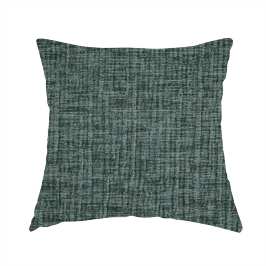 The fabric used to create this handmade cushion is a textured upholstery fabric in a deep teal or eucalyptus green colour. The material features a distinct cross-hatched slub texture with subtle vertical and horizontal ridges, creating a soft, dimensional chenille finish.