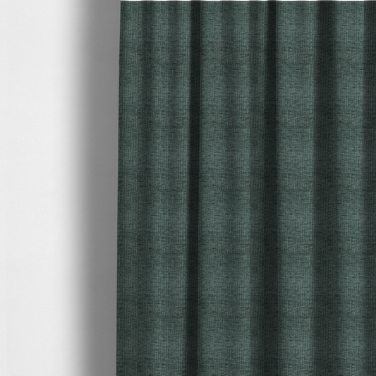 The fabric used to create these made-to-measure curtains is a textured upholstery fabric in a deep teal or eucalyptus green colour. The material features a distinct cross-hatched slub texture with subtle vertical and horizontal ridges, creating a soft, dimensional chenille finish.