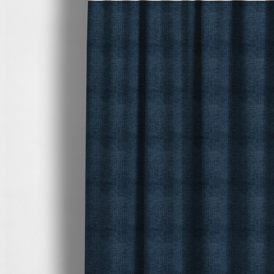 The fabric used to create these made-to-measure curtains is a textured upholstery fabric in a deep navy or midnight blue shade. The material features a distinct cross-hatched slub texture with prominent vertical and fine horizontal ridges, creating a soft, dimensional chenille finish.