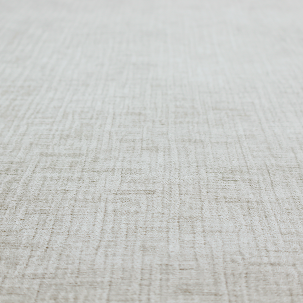 A textured upholstery fabric in a light silver or pale grey colour. The material features a subtle cross-hatched slub texture with fine vertical and horizontal ridges, creating a soft, dimensional chenille finish.