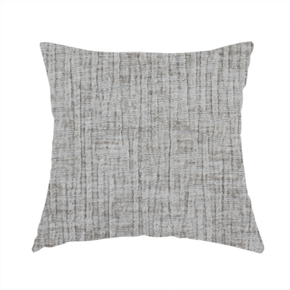 The fabric used to create these handmade cushions is a textured upholstery fabric in a mid-tone grey or pebble shade. The material features a distinct cross-hatched slub texture with prominent vertical and fine horizontal ridges, creating a soft, dimensional chenille finish.