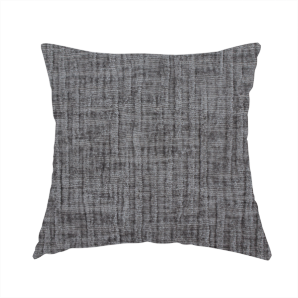 The fabric used to create this handmade cushion is a textured upholstery fabric in a charcoal or dark grey shade. The material features a distinct cross-hatched slub texture with subtle vertical and horizontal ridges, creating a soft, dimensional chenille finish.