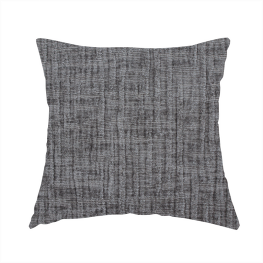The fabric used to create this handmade cushion is a textured upholstery fabric in a charcoal or dark grey shade. The material features a distinct cross-hatched slub texture with subtle vertical and horizontal ridges, creating a soft, dimensional chenille finish.