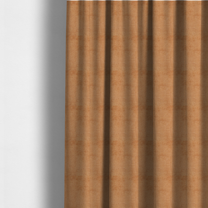 The fabric used to create these made-to-measure curtains is a textured fabric swatch in a warm terracotta or burnt orange colour. The material features a dense, uniform nubby weave with a soft, matte appearance, resembling chenille or bouclé cloth.