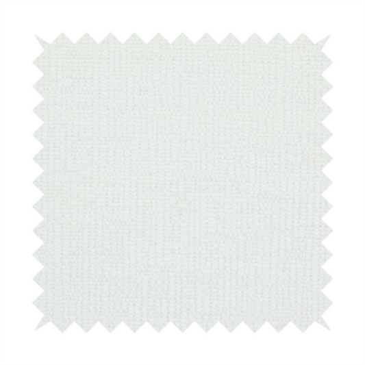 A textured fabric swatch in a crisp, clean white or off-white colour. The material features a dense, uniform nubby weave with a soft, matte finish, creating a bright and minimalist appearance.