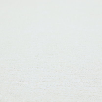 A textured fabric swatch in a crisp, clean white or off-white colour. The material features a dense, uniform nubby weave with a soft, matte finish, creating a bright and minimalist appearance.