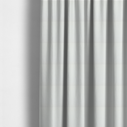 The fabric used to create these made-to-measure curtains is a textured fabric swatch in a crisp, clean white or off-white colour. The material features a dense, uniform nubby weave with a soft, matte finish, creating a bright and minimalist appearance.