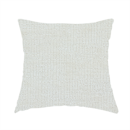 The fabric used to create this handmade cushion is a textured fabric swatch in a soft cream, ivory, or natural off-white colour. The material features a dense, uniform nubby weave with subtle warm undertones, creating a cosy and clean appearance.