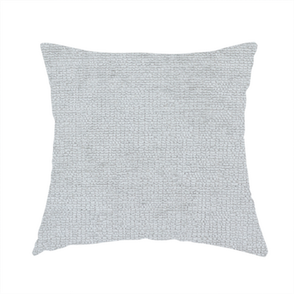 The fabric used to create this handmade cushion is a textured fabric swatch in a very pale, light grey or silver colour. The material features a dense, uniform nubby weave with subtle neutral undertones, creating a soft, clean, and modern appearance.