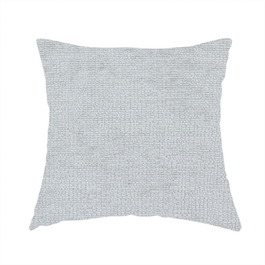 The fabric used to create this handmade cushion is a textured fabric swatch in a very pale, light grey or silver colour. The material features a dense, uniform nubby weave with subtle neutral undertones, creating a soft, clean, and modern appearance.