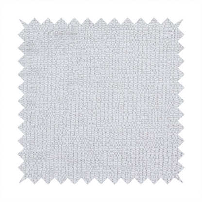 A textured fabric swatch in a very light, icy grey or pale ash colour. The material features a dense, uniform nubby weave with bright neutral tones, creating a clean, crisp, and contemporary appearance.