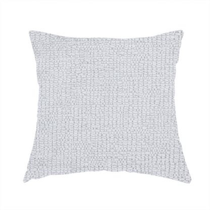 The fabric used to create this handmade cushion is a textured fabric swatch in a very light, icy grey or pale ash colour. The material features a dense, uniform nubby weave with bright neutral tones, creating a clean, crisp, and contemporary appearance.