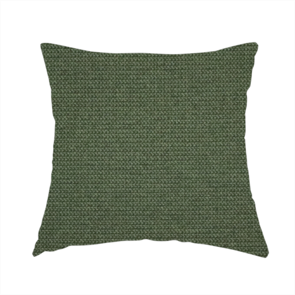The fabric used to create this handmade cushion is a textured moss green fabric with a tight, uniform weave.