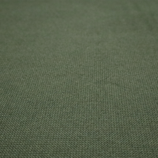 A textured moss green fabric with a tight, uniform weave.