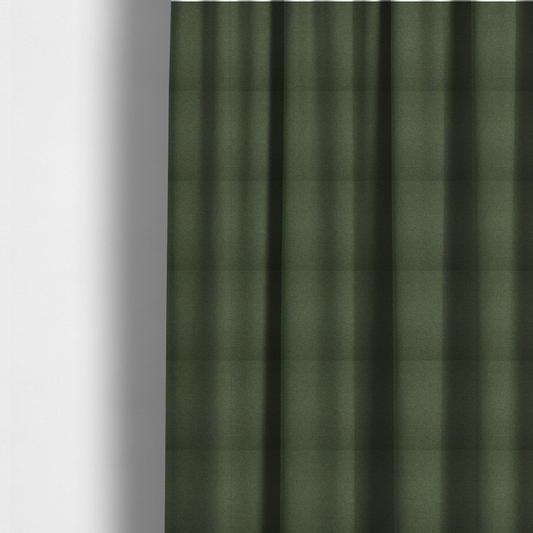 The fabric used to create these made-to-measure curtains is a textured moss green fabric with a tight, uniform weave.