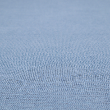 A textured cornflower blue fabric with a tight, uniform cross-weave.