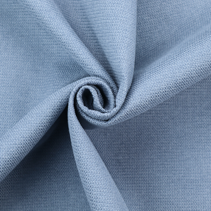 A textured cornflower blue fabric with a tight, uniform cross-weave.